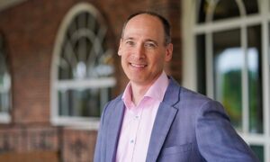 Professional headshot of Alan Jacobson, Alteryx chief data and analytics officer