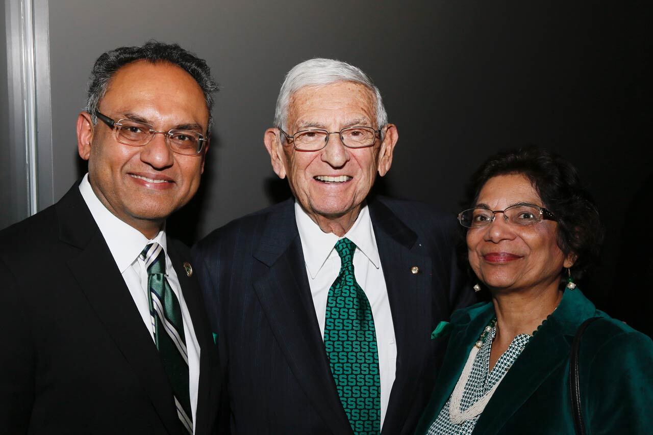 Eli Broad poses with Sanjay and Kiran Gupta in Los Angeles, March 2017