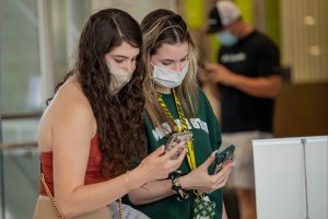 Students using smartphones at the 2021 Broad College Fall Welcome event.
