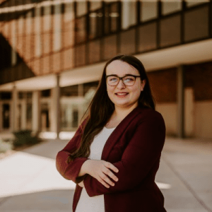 Headshot of Rylee Egan outside the Edward J. Minskoff Pavilion on campus