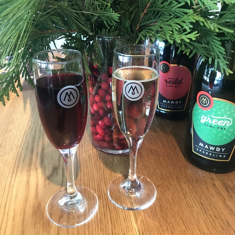 MAWBY wine glasses filled with wine from the MAWBY vineyard.